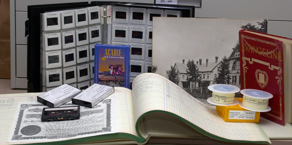 photo of slides, books, videos, photos, and film strips that are part of the Archives' collections