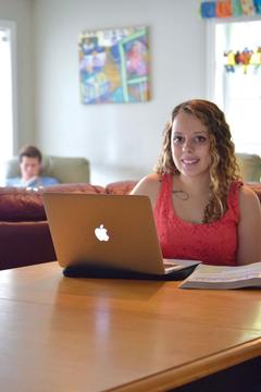 Student working on a Mac computer