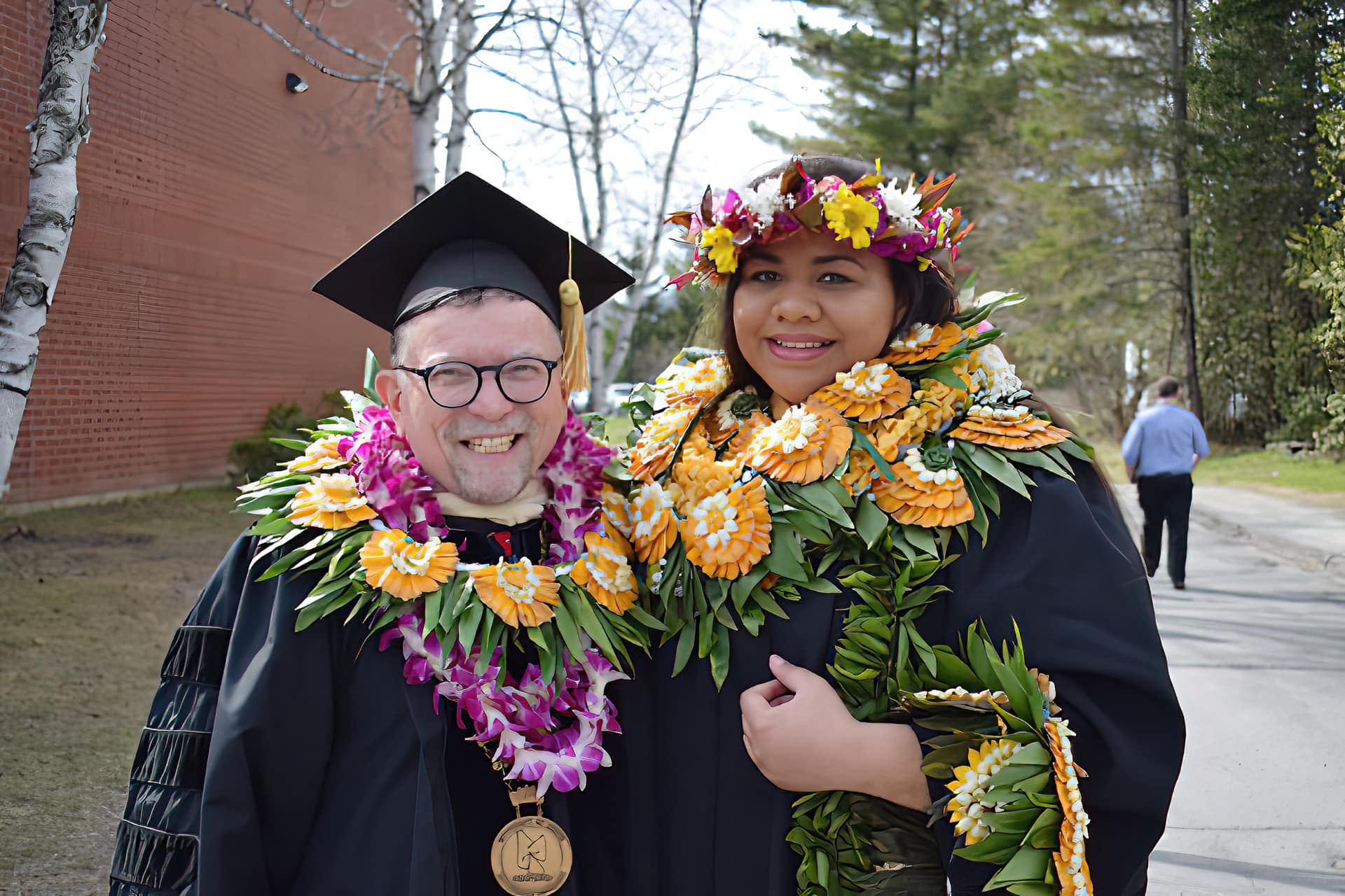 UMFK President Dr. John N. Short and recent graduate from Hawaii, Sweet Vaimoui 