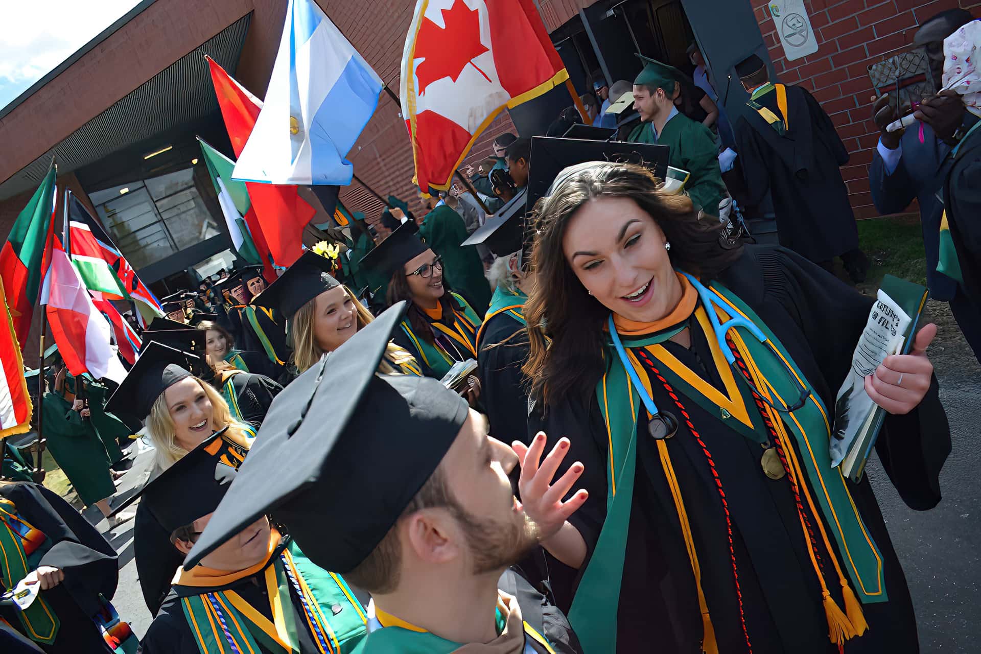 UMFK Graduates leaving the ceremony that was held at the UMFK sports center