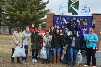 In honor of Earth Day, thirteen University of Maine at Fort Kent Student Nurses Organization members picked up trash while "walking the mills" in Fort Kent. "Walking the Mills" is a local phrase that students and Fort Kent residents use when referring to a popular route for walkers, joggers, and cyclists. The following UMFK nursing students participated in this community service: (l to r)  Mary Trudeau, Emily Gardner, Sterlin Joudain, Mequeline Smith, Brittany Rice, Mathew Merchant, Jiaying Lu, Julia Destefano, Magela Laurore, Arrabine Dunn, Frantzceau Germain, Jennie Charette, and Kate Dorsey.