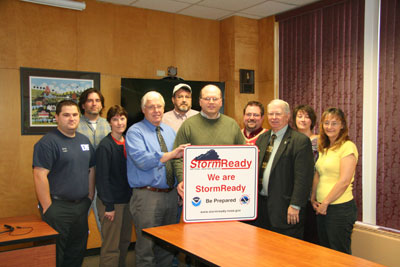 UMFK deemed StormReady (front l to r) Joshua Belanger, Leslie Kelly, John Murphy, Timothy Duda, Wilson Hess, and Lisa Fournier (back l to r) Arthur Drolet, Andrew Jacobs, Ray Phinney, and Tammy Connor.