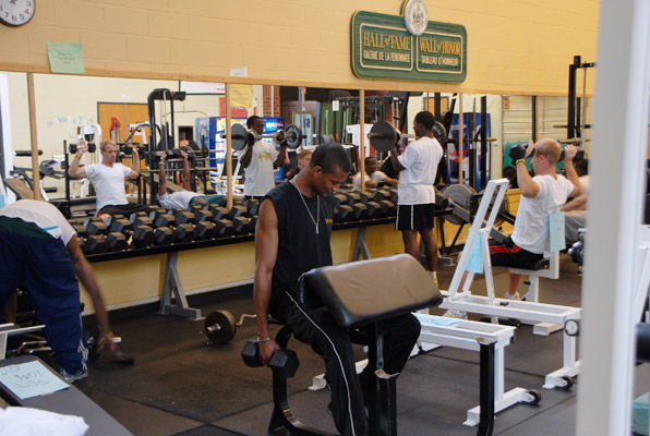 students using the weight room at the UMFK Sports Center