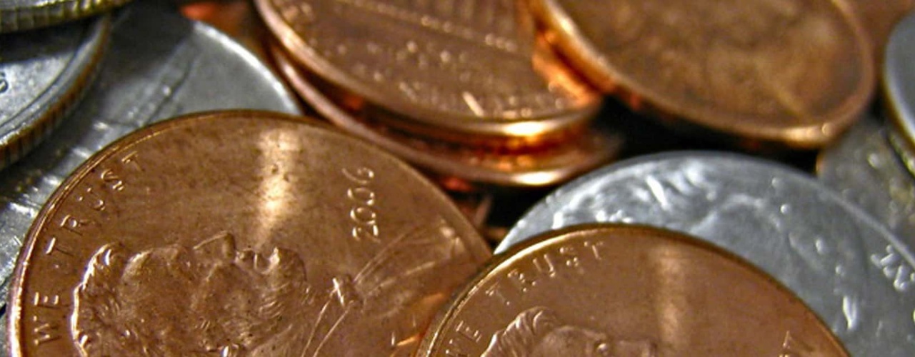 Coins spread across a table