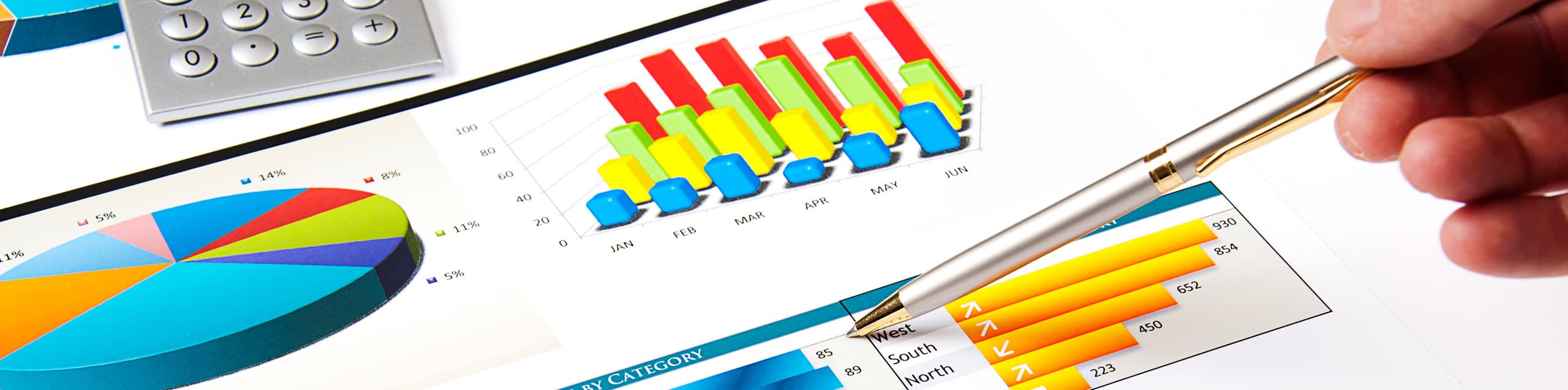 person pointing to something on a chart with his pen